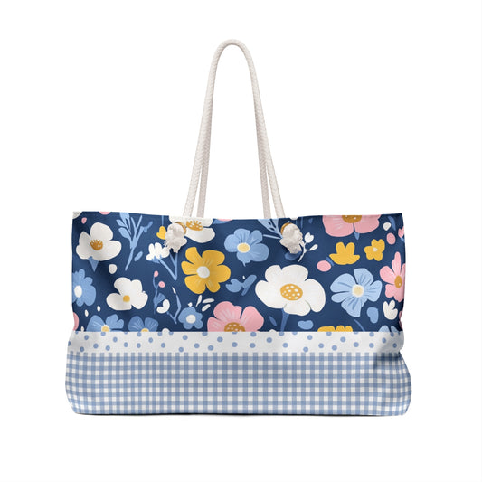Floral-patterned tote bag with a blue gingham base on a white background